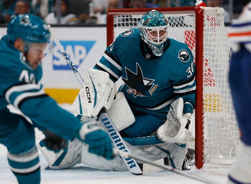 Sharks rookie goalie put in difficult spot in first NHL start