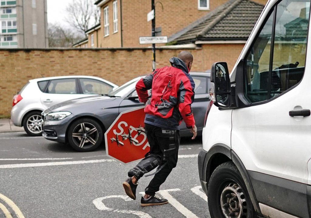 Suspect arrested in alleged theft of a Banksy stop sign decorated with military drones