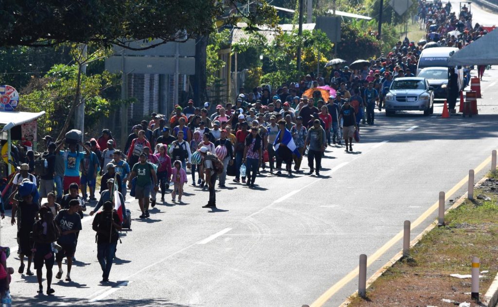 Migrant caravan in southern Mexico marks Christmas Day by trudging onward