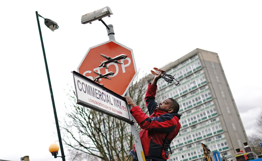 New Banksy artwork taken from London street as crowd looks on