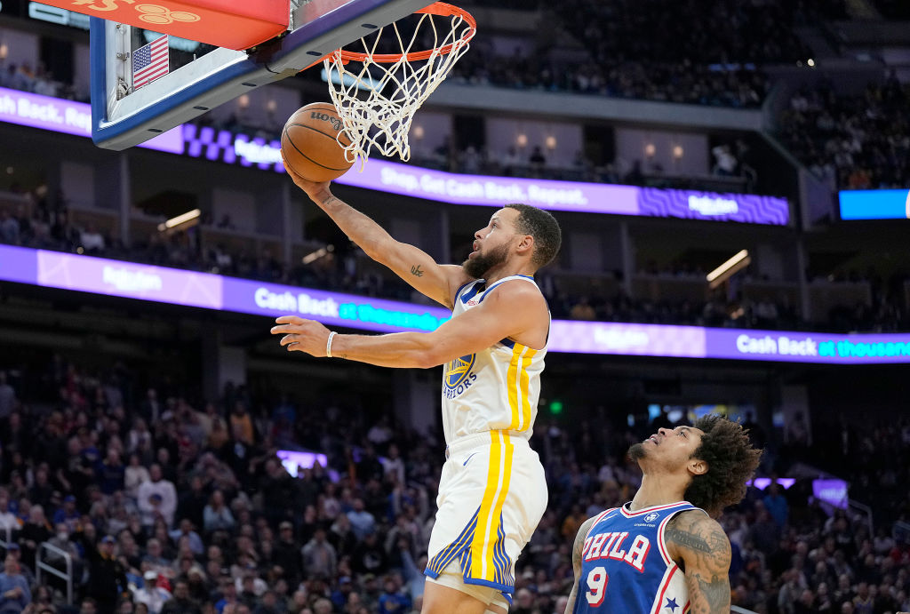 Photos: Warriors host Super Bowl-bound 49ers during win over 76ers