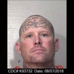 Alleged Aryan Brotherhood member pleads guilty to prison murder with RICO trial weeks away