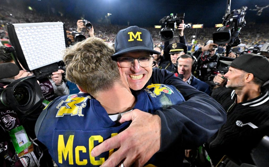 Michigan beats Alabama 27-20 in OT on Corum’s TD run to reach national title game