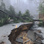 Northern California community trapped without power after rain washes out roads