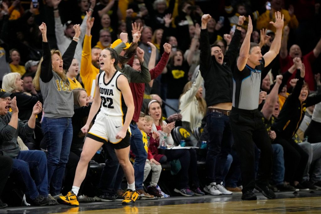 Iowa’s Caitlin Clark breaks NCAA women’s career scoring record, eclipsing Kelsey Plum’s mark