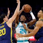 Warriors bottle up Hornets to keep rolling