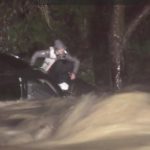 3 people saved from tree after SUV is washed down Southern California creek