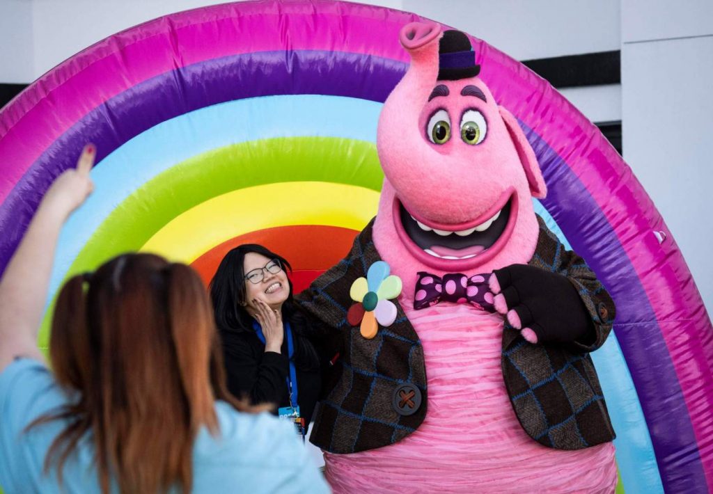 Bing Bong brings his rainbow wagon to Disneyland’s Pixar Place Hotel