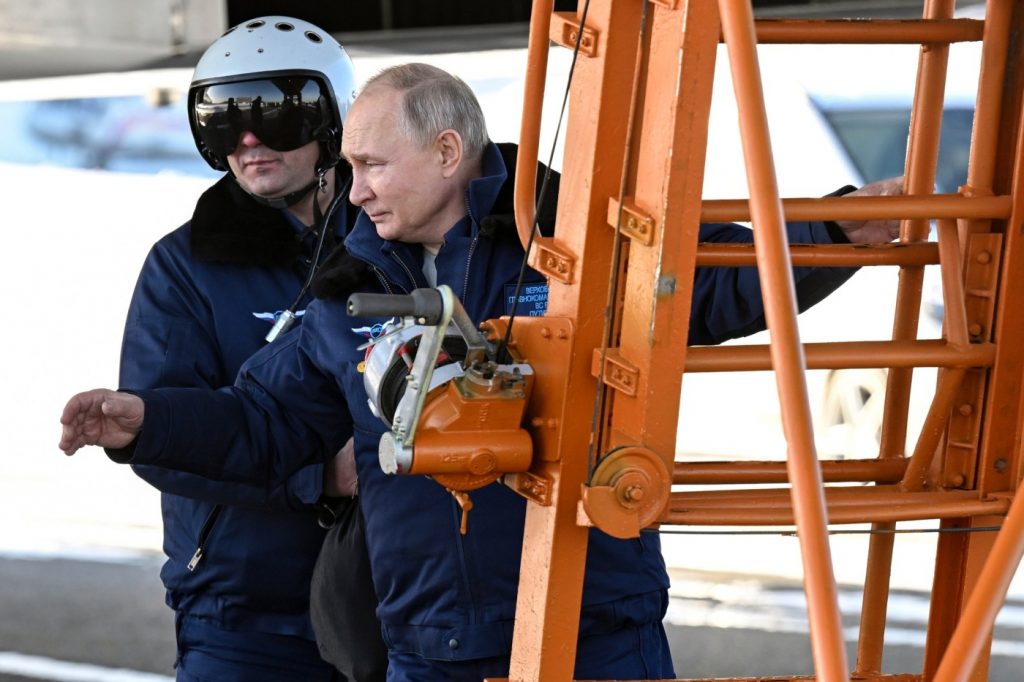 Putin flies on nuclear-capable bomber in message to West