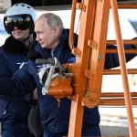 Putin flies on nuclear-capable bomber in message to West