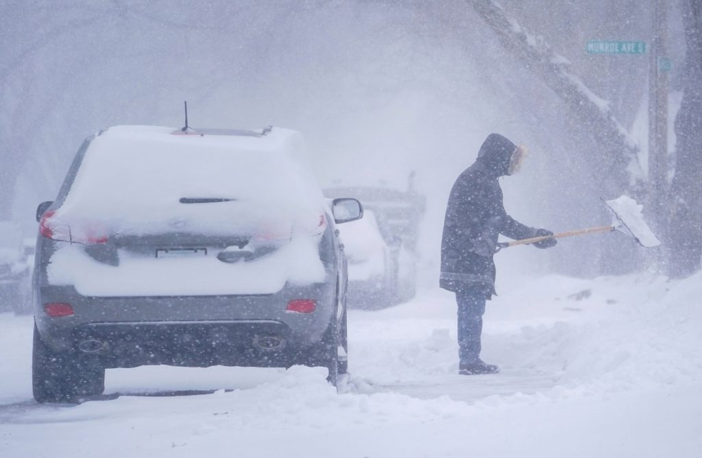 Northwest shivers while Midwest gets sunny taste of summer