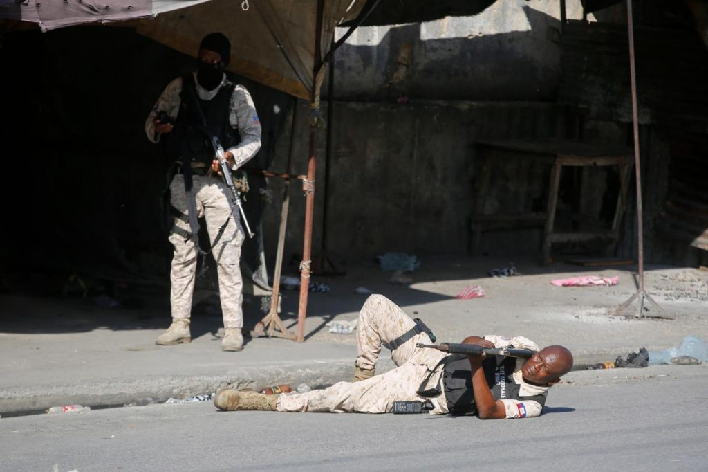 Hundreds of inmates flee after armed gangs storm Haiti’s main prison, leaving bodies behind