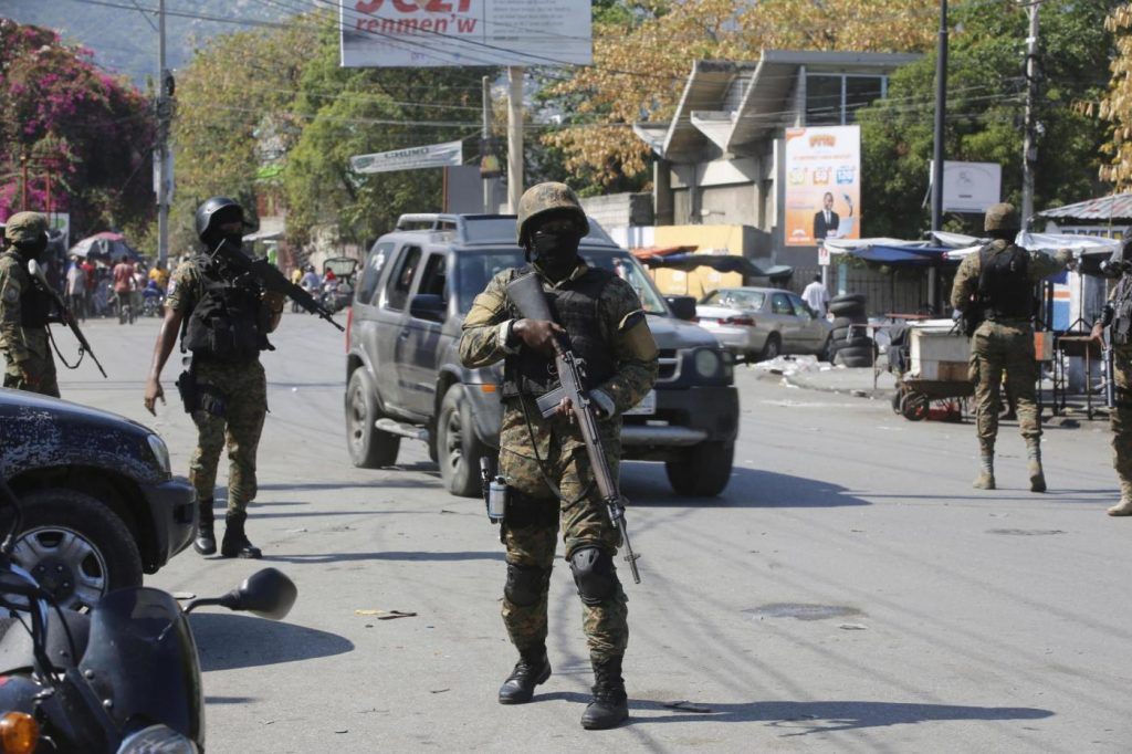 US forces fly in to beef up security at embassy in Haiti and evacuate nonessential personnel