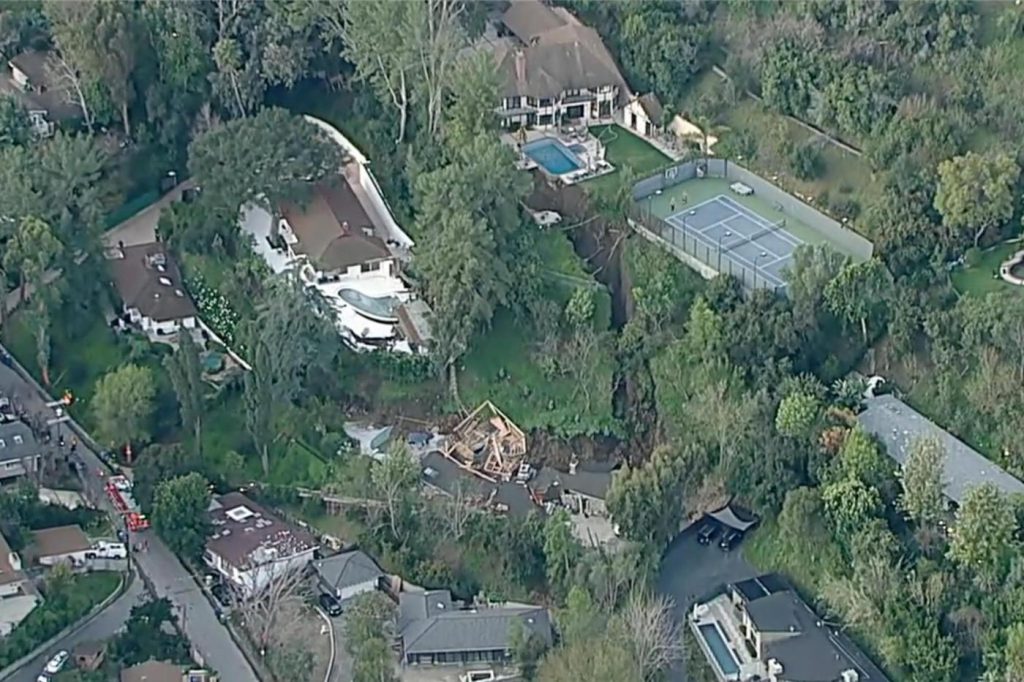 Landslide destroys Southern California home and threatens at least two others