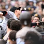 Wilmer Flores leaves SF Giants game after tumbling over dugout railing