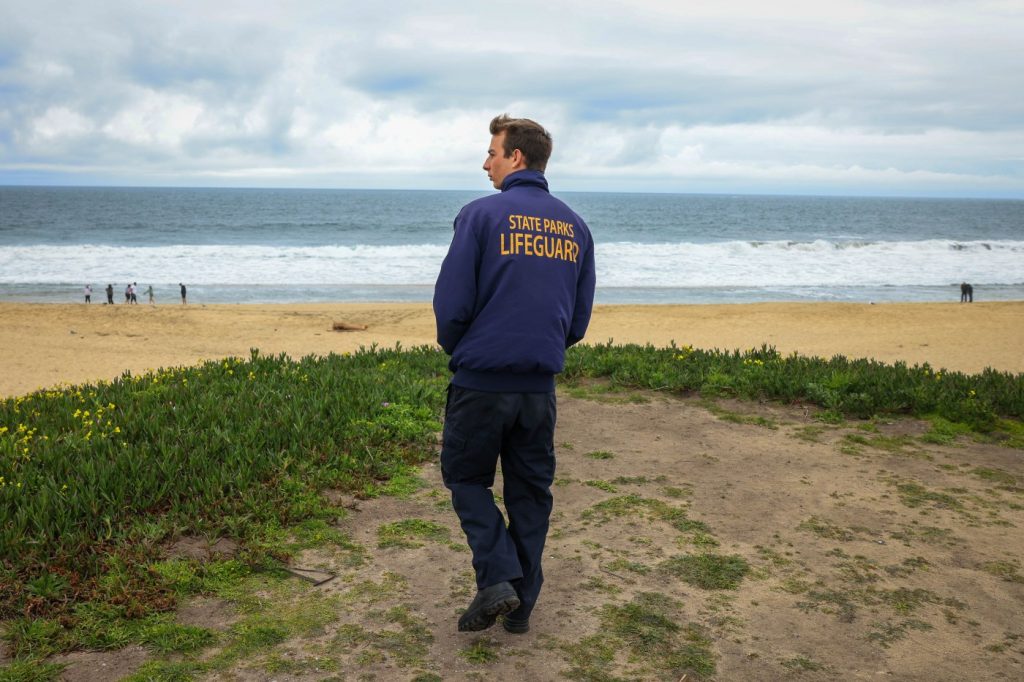 Young ‘hero’ Half Moon Bay lifeguard recounts saving father and son from relentless rip currents