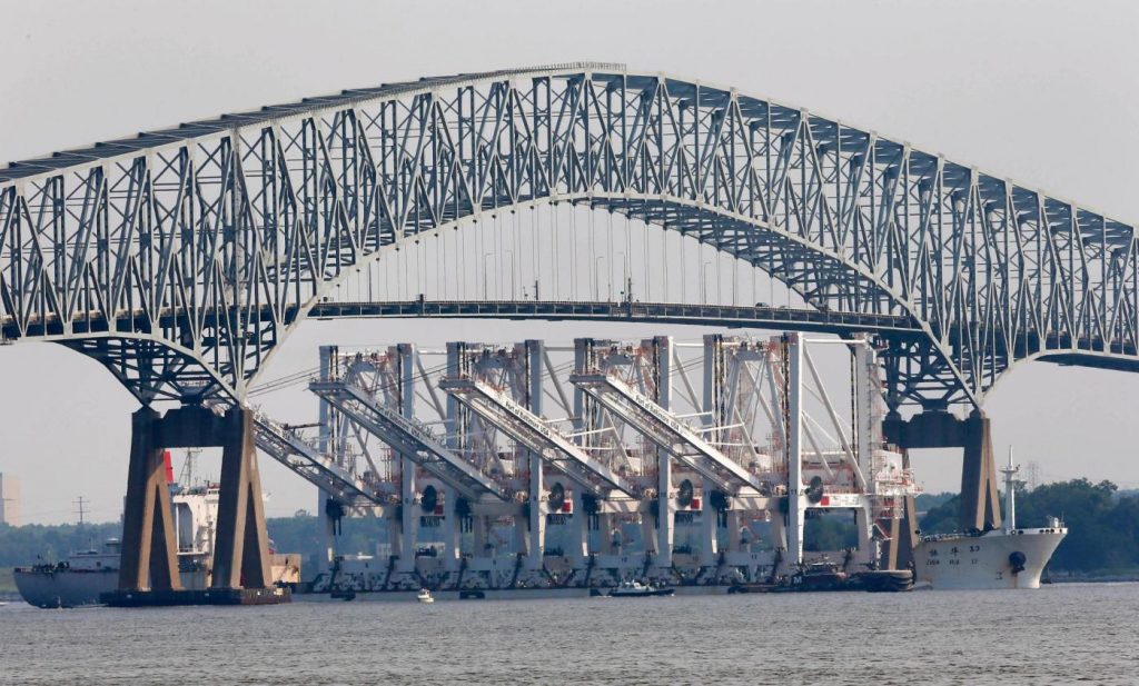 Cargo ship hits Baltimore’s Key Bridge, bringing it down. Several people believed to be in water