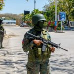 Haitian leader arrives in Puerto Rico as gangs battle for power