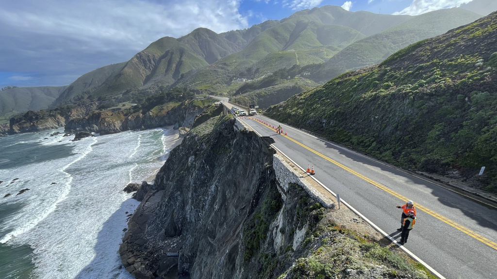 Crews escorting cars around damaged section of Highway 1 near Big Sur after lane collapsed in storm