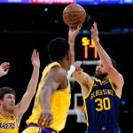 Warriors shoot the lights out to hold off Lakers