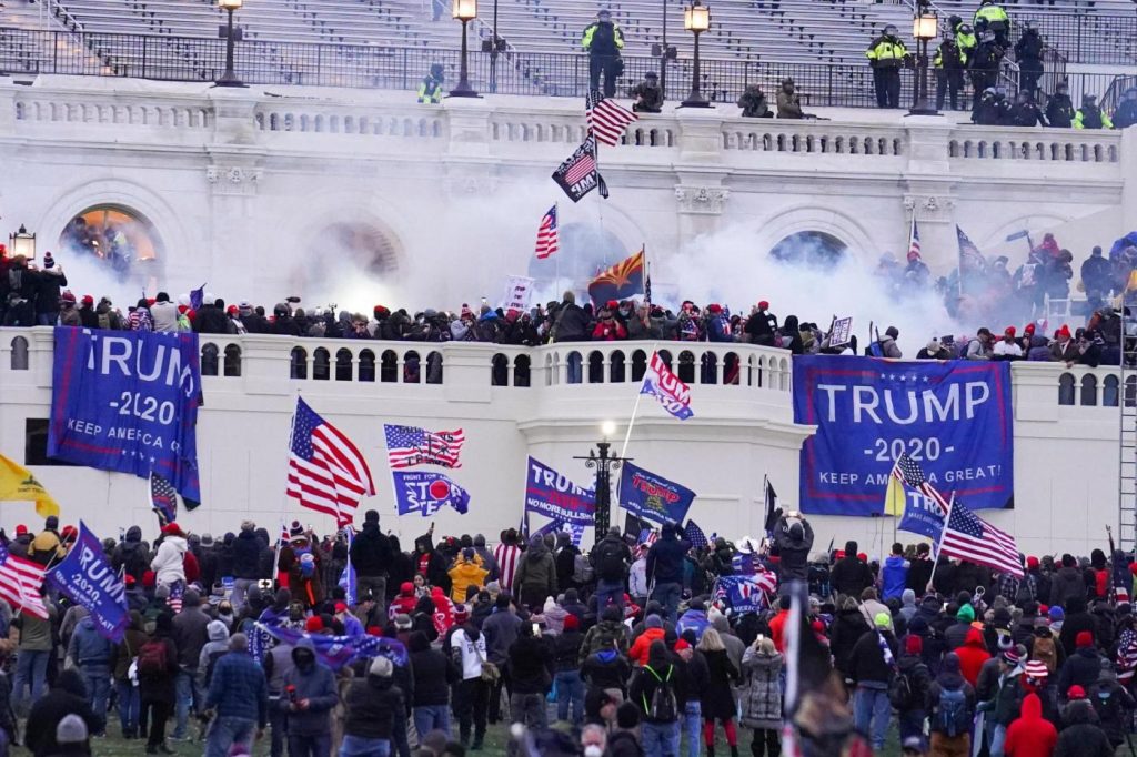 Man who attacked police after storming Capitol with Confederate flag gets over 2 years in prison