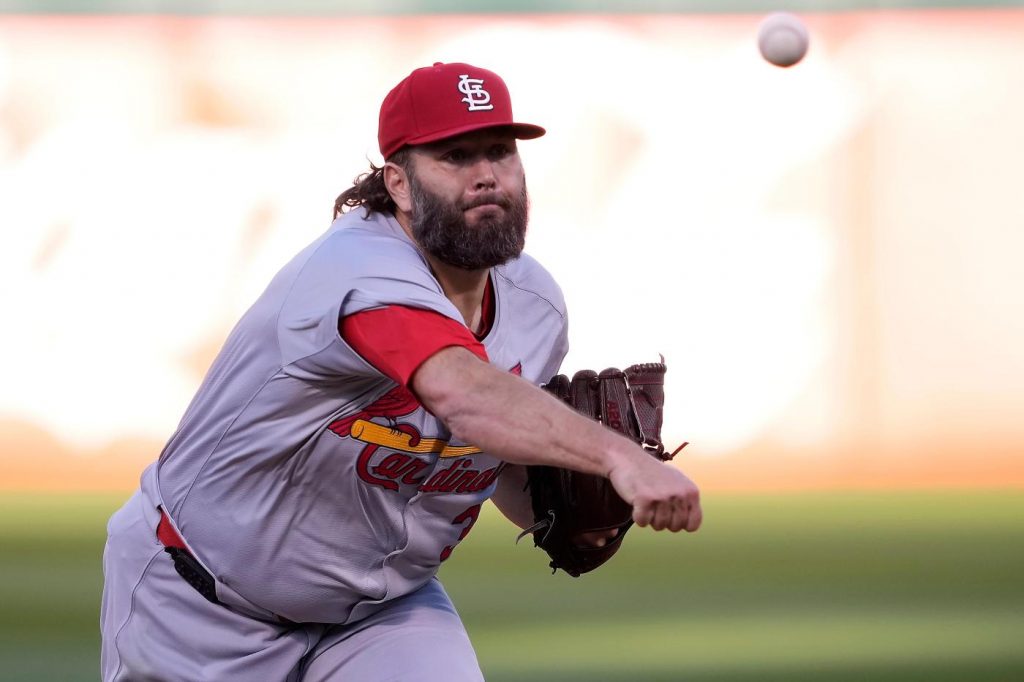 Lynn earns his first win in second stint with Cards, who beat A’s before season-low crowd of 3,296