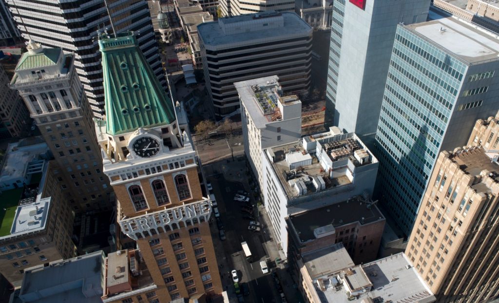 He was seen walking into the Oakland Tribune tower, then disappeared until a grisly discovery in the hills. Police say they now have the answers