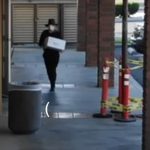 Robber shot by police tried to re-enter California bank with apparent explosive, body-worn camera footage shows