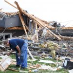 Residents begin going through the rubble after tornadoes hammer parts of Nebraska and Iowa