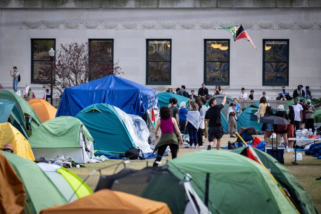 Columbia begins suspending students in protest camp