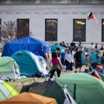 Columbia begins suspending students in protest camp