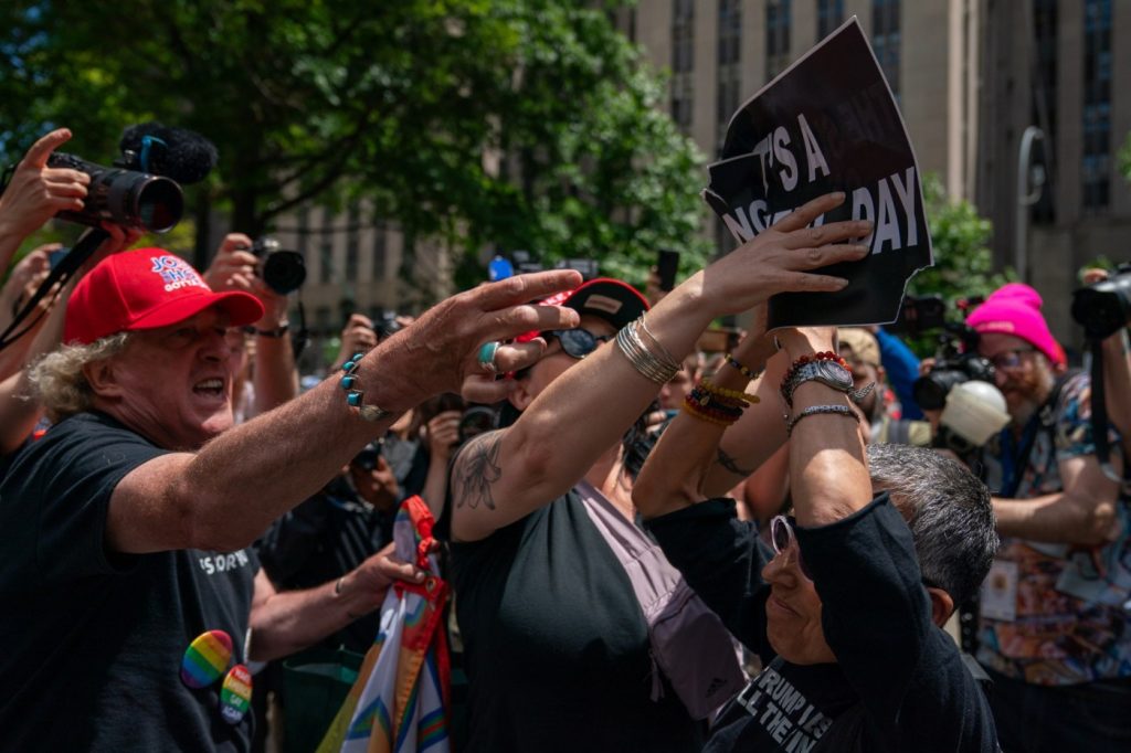 Protesters faced off outside courthouse as Trump awaited hush money trial verdict