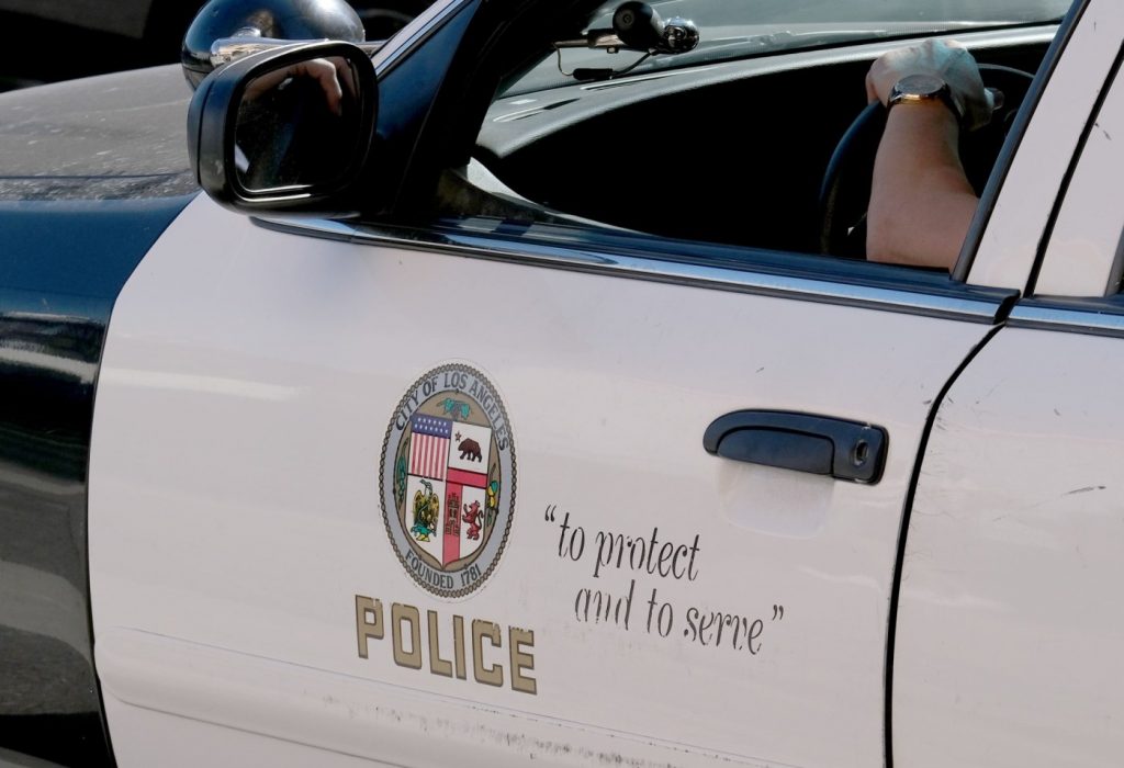 COP hurt when man carjacks and then crashes LAPD patrol vehicle