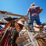 In a north Texas county, dazed residents sift through homes mangled by a tornado