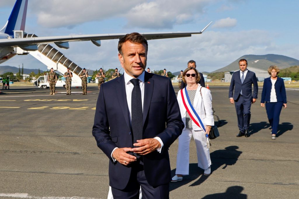 French president visits New Caledonia amid fiery unrest