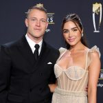 Olivia Culpo and Christian McCaffrey defend her wedding dress, which wasn’t supposed to ‘exude sex’