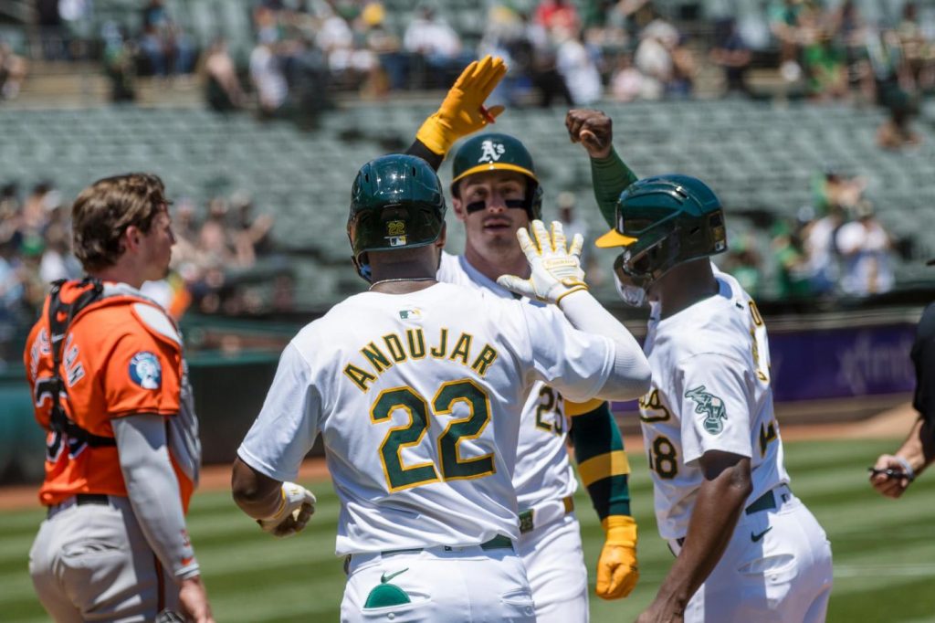 Rooker, Schuemann hit 3-run homers in Athletics’ 19-8 rout of Orioles