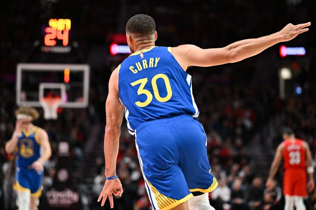 Curry, Hield lead Warriors past Blazers to open season with blowout win