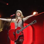 Man buys Taylor Swift-autographed guitar at charity auction, smashes it with hammer