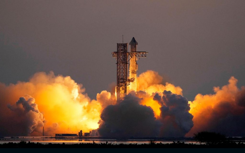 In an engineering feat, mechanical SpaceX arms catch Starship rocket booster back at the launch pad