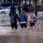 At least 63 people die in devastating flash floods in eastern Spain, officials say