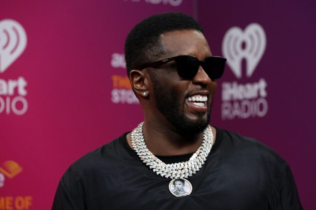 Diddy was about to assault man at party, suit says. Then a mystery athlete walked in