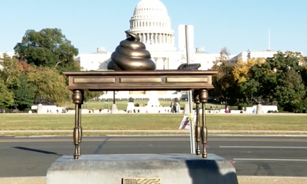 New art on National Mall: poop on Nancy Pelosi’s desk