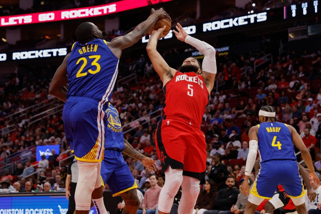 Warriors blow 31-point lead, but avoid late collapse to beat Rockets in overtime